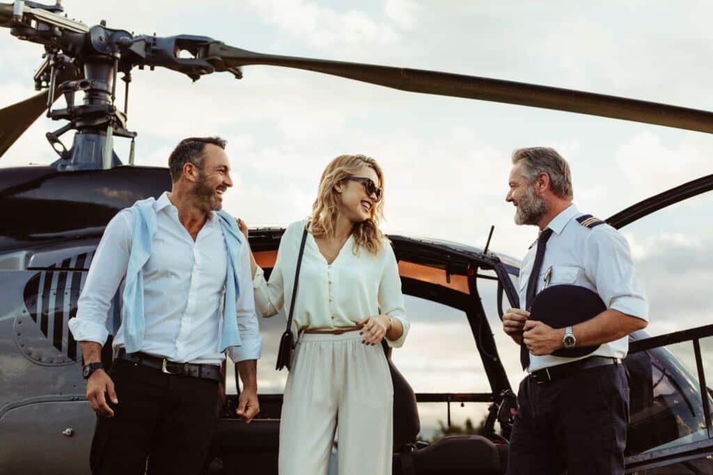 Luxury and private helicopter passengers welcomed by pilot